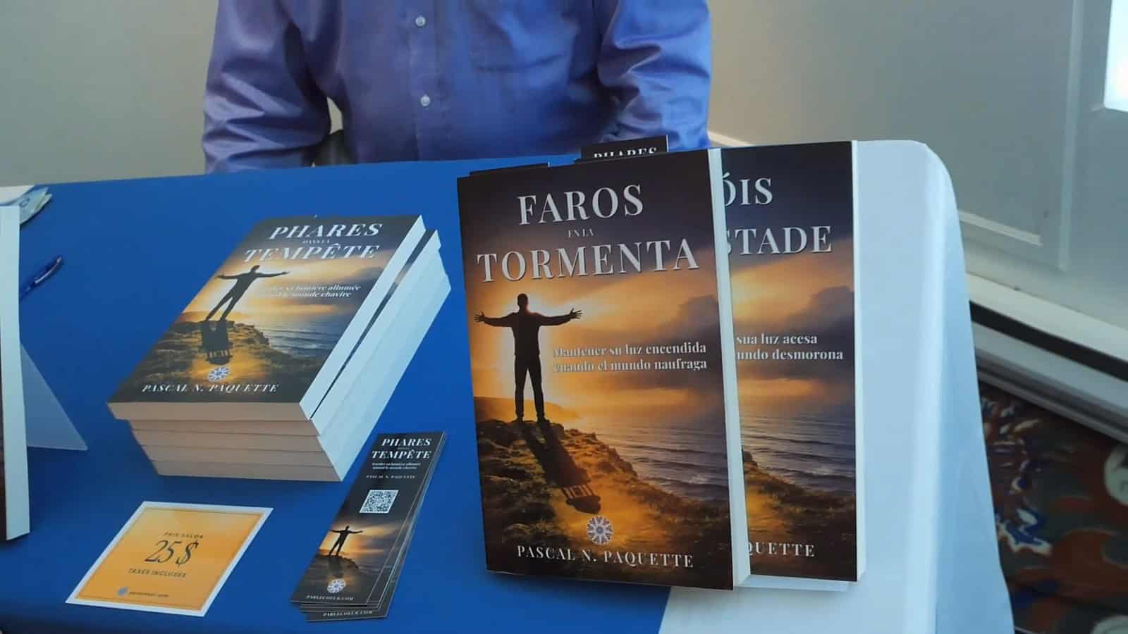 Phares dans la Tempête and Faros en la Tormenta on the book-signing table